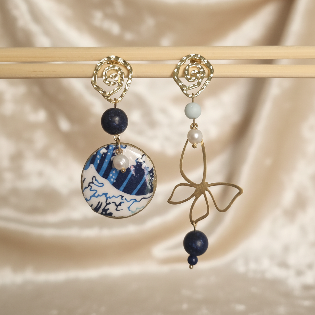 Orecchini con onda su velluto crema