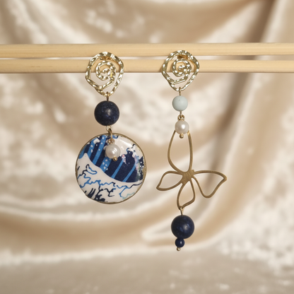 Orecchini con onda su velluto crema