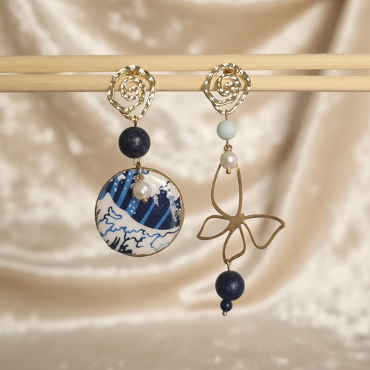 Orecchini con onda su velluto crema