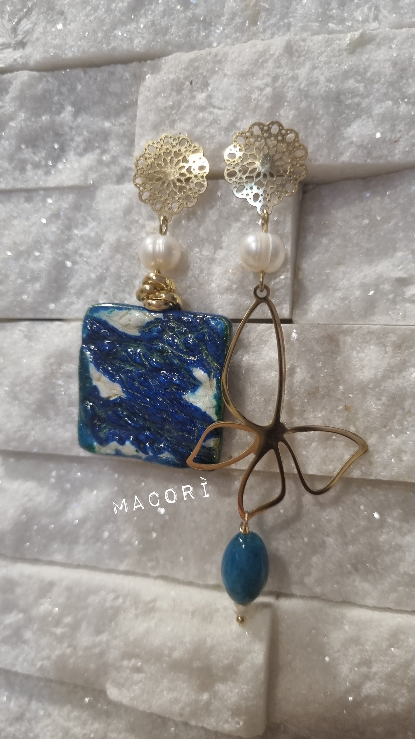 Orecchini asimmetrici Oltre Oceano