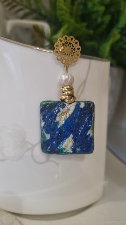 Orecchini asimmetrici Oltre Oceano